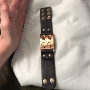 Leather spikes wrist cuff. Very well made.